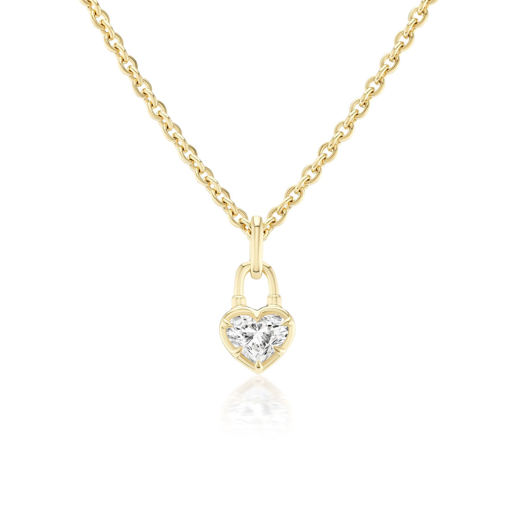The Collet Set Locket Motif Diamond Pendant Necklace is a yellow gold chain with a heart-shaped locket and a central sparkling diamond, shown on a white background.