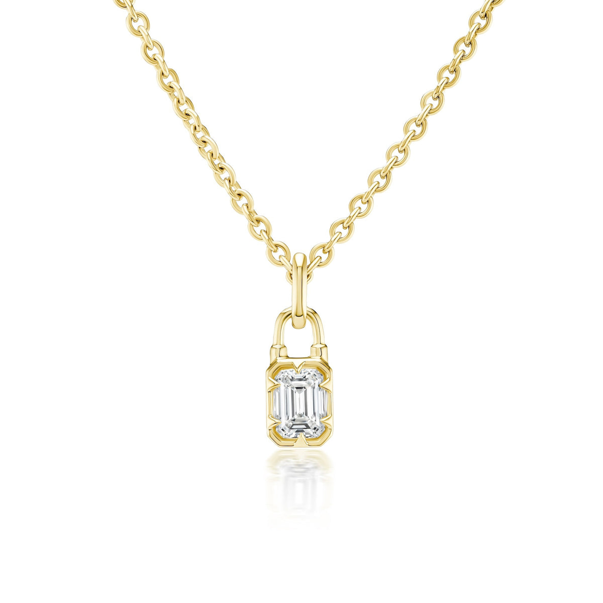 The Collet Set Locket Motif Diamond Pendant Necklace features a rectangular emerald-cut diamond in a sleek modern gold bezel, crafted in your choice of yellow or white gold for a contemporary look.