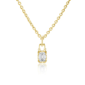 The Collet Set Locket Motif Diamond Pendant Necklace features a rectangular emerald-cut diamond in a sleek modern gold bezel, crafted in your choice of yellow or white gold for a contemporary look.