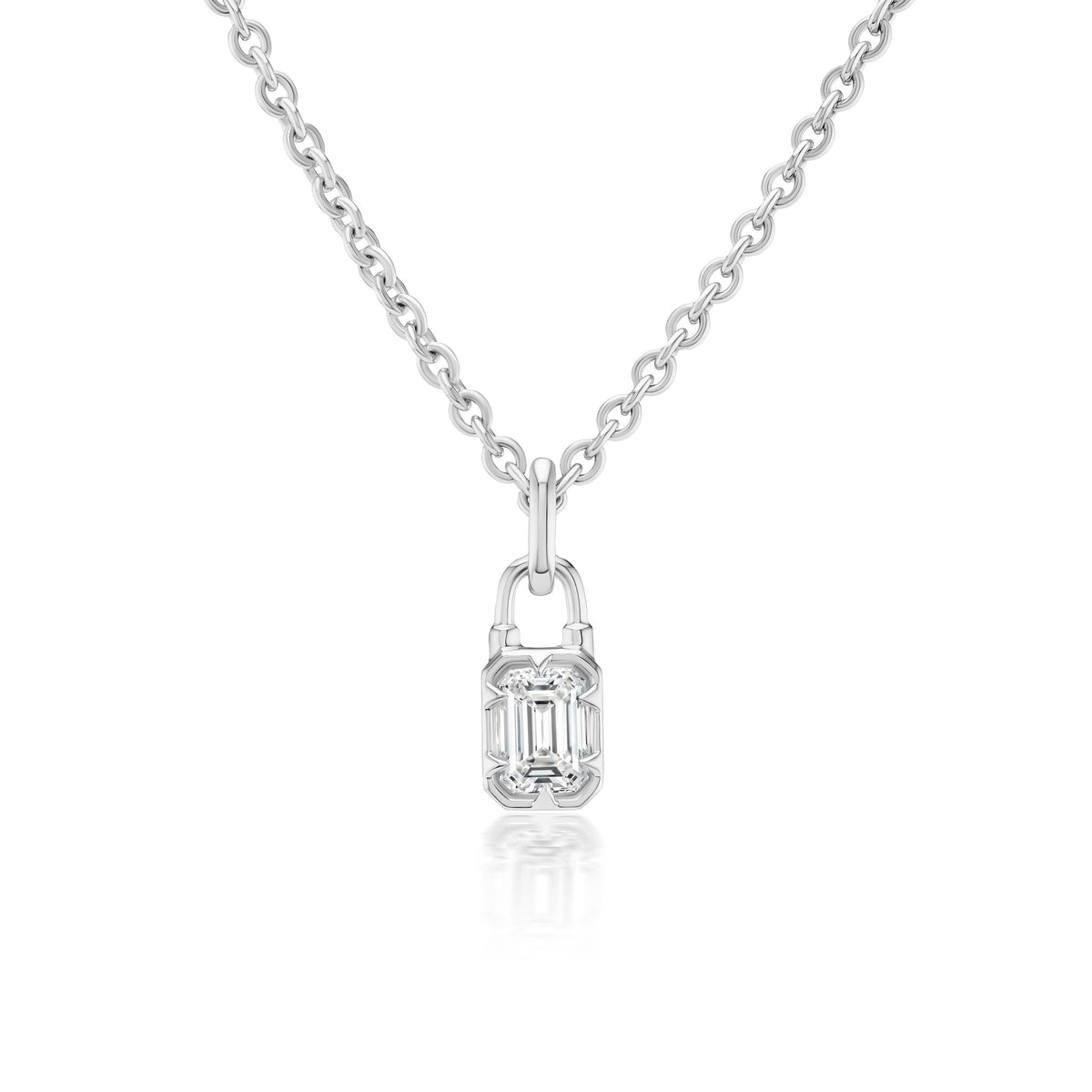 The Collet Set Locket Motif Diamond Pendant Necklace is a silver chain with a padlock-shaped pendant featuring an emerald-cut diamond at its center.