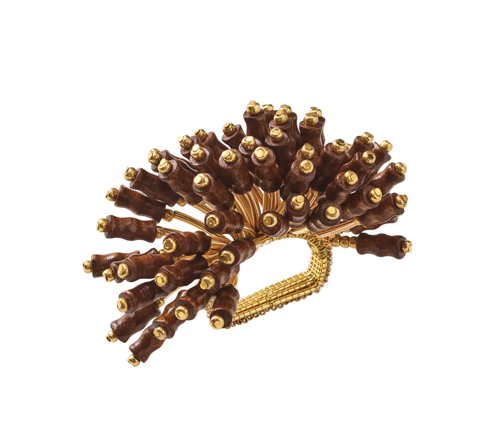 Close-up of Royal Palm Napkin Ring in Brown and Gold showcasing hand-arranged wooden beads and gold details on white background