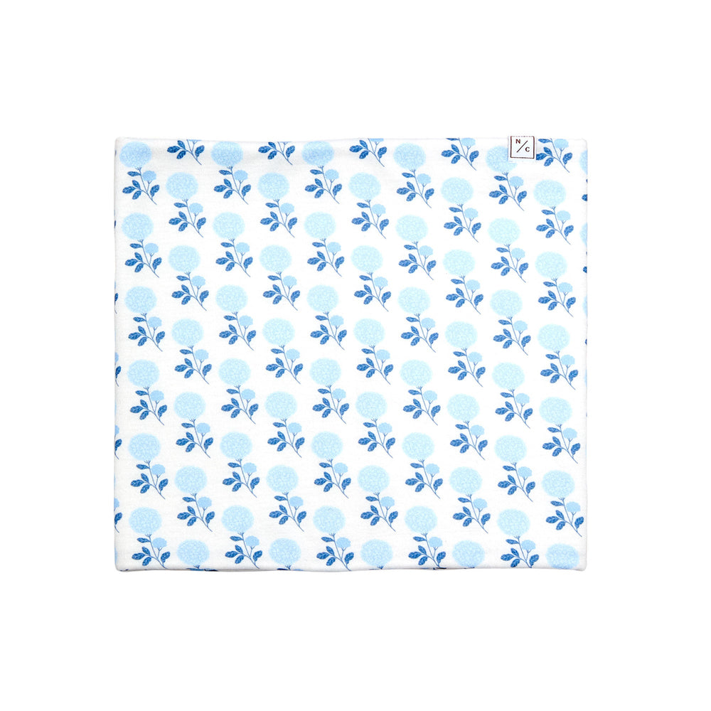 Folded front view of Blue Hydrangea fleece-lined neck warmer showcasing light blue hydrangea floral print and soft microfleece lining on white background