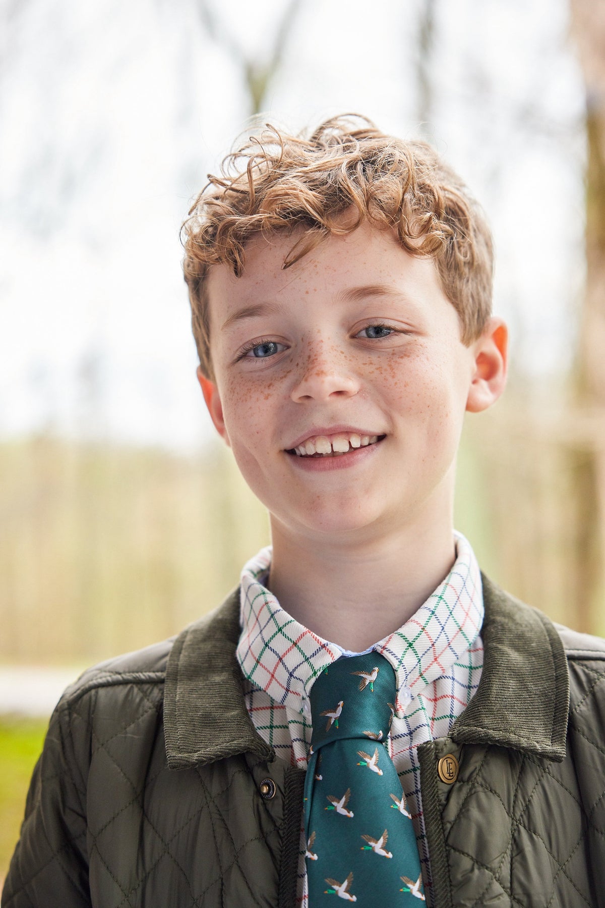 Little English traditional children's clothing.  Boy's hunter green patterned neck tie with mallards for formal occasions.