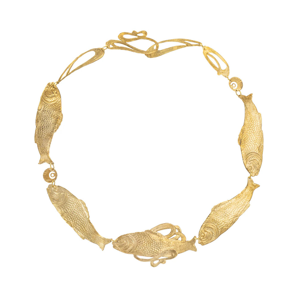 Top-down view of Sacred Cod Collar necklace showcasing sculptural brass fish links on a white background