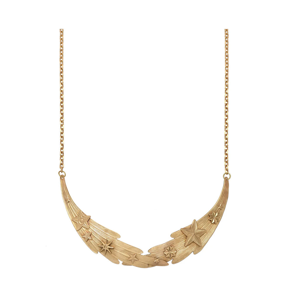 Front view of Starry Comet Collar necklace showcasing hammered brass crescent with raised star motifs on white background