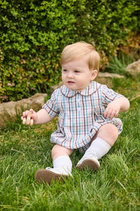 Little English traditional children's clothing.  Short sleeve peter pan bubble in brown, blue, and pink Wilmington Plaid for baby boys with button tabs and corduroy piping.