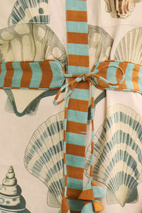 Close up of The Nicole Dress in Somers Shell Cream. 
