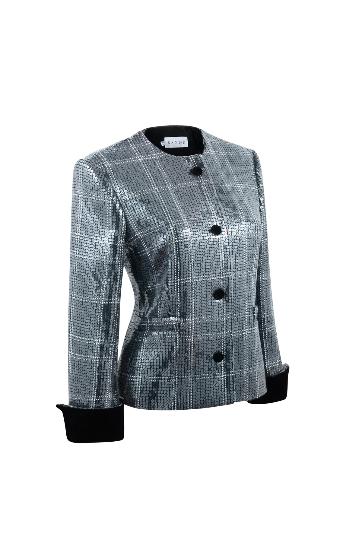 Three-quarter view of Noor Sequin in Silver blazer with silver sequins, black velvet accents, and cropped silhouette
