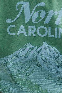 Close up of the North Carolina Tee in Pine Grove