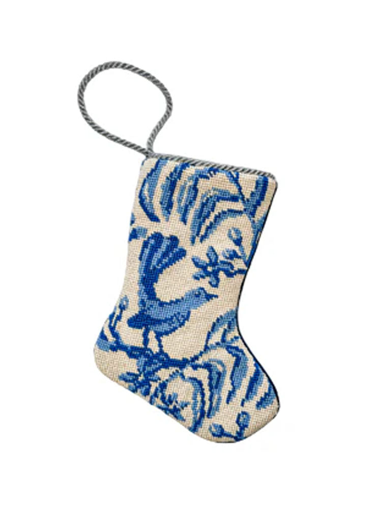 Angled view of Sarah’s Songbird bauble stocking showcasing blue needlepoint bird motif and twisted hanging loop with white background
