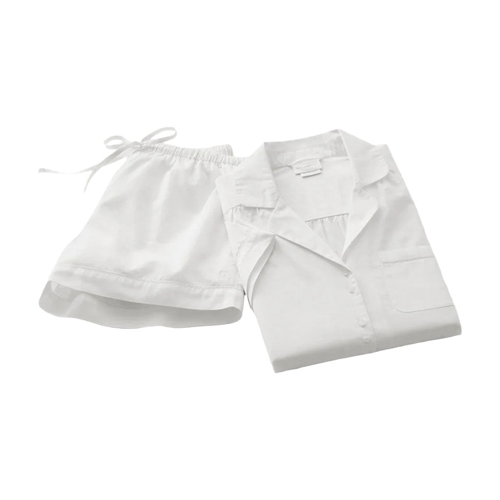 Top view of Women’s Signature Short Sleeve & Shorts Pajama Set in White with buttoned shirt and drawstring shorts on white