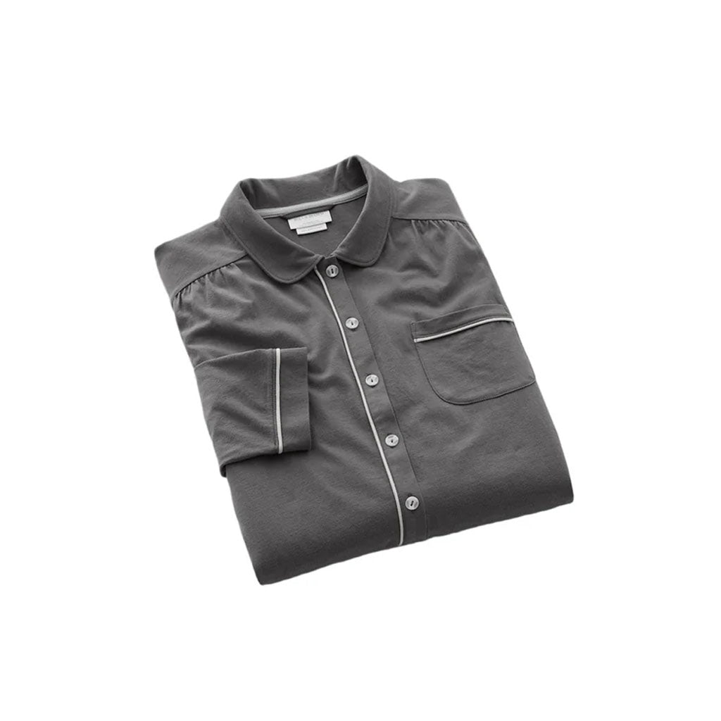 Folded front view of soft knit women’s sleepshirt in Night showing button-front placket, piped trim and chest pocket on white background