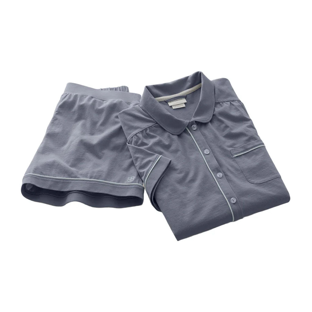 Flat lay of Women’s Soft Knit Short Sleeve & Shorts Pajama Set in Mineral showcasing button-down shirt and contrast piping