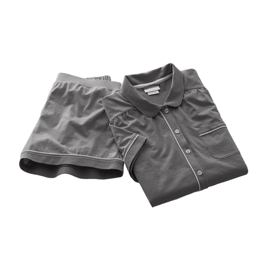 Top view of Women’s Soft Knit Short Sleeve & Shorts Pajama Set in Night showcasing piping and pockets on white background