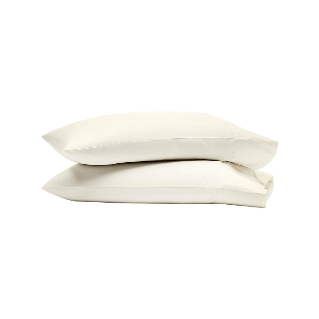 Stacked view of Percale Hemmed Pillowcase Set in Cream showcasing the 7 inch hemline on a white background
