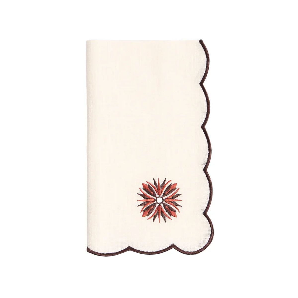 Front view of Botanica Embroidered Napkin showcasing scalloped burgundy edging and terracotta floral medallion on white
