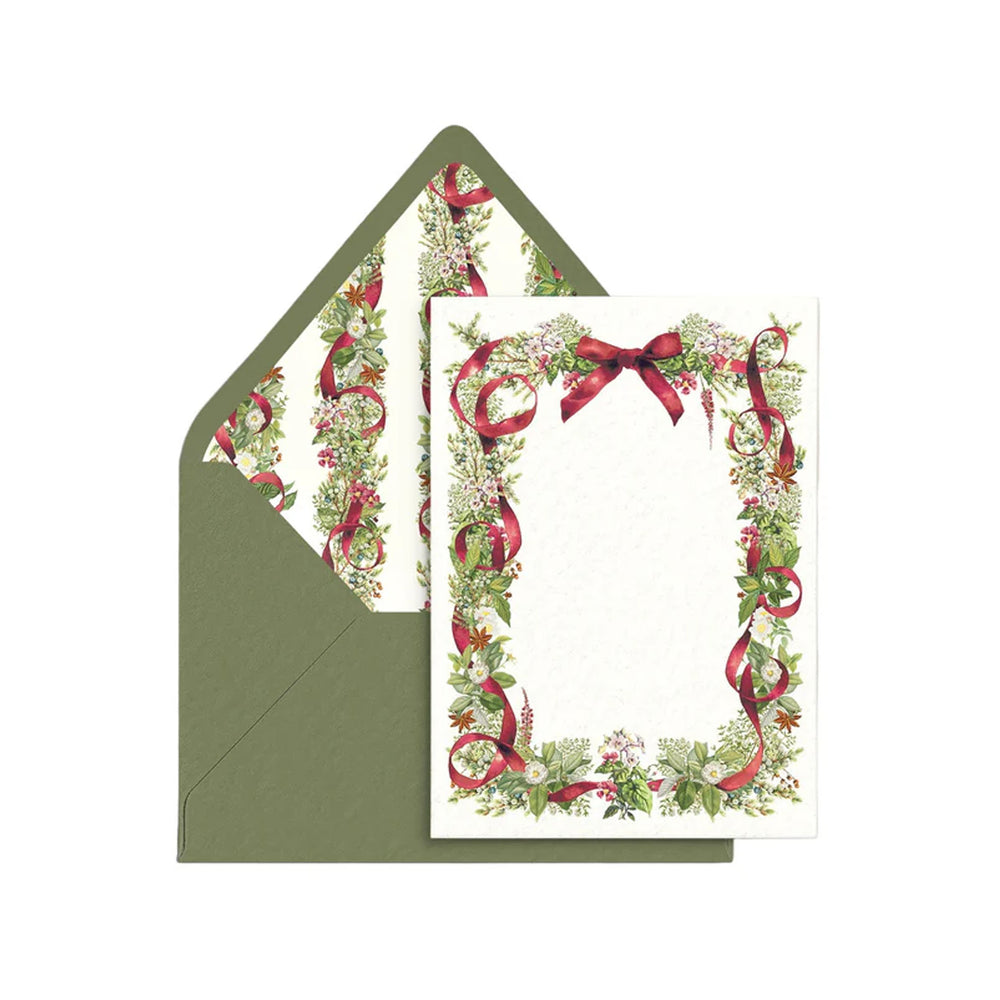 Front view of Holly Jolly stationery set: cream card with holly and red ribbon border and matching olive-green envelope