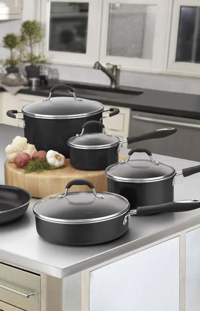 Front view of Advantage 11 Piece Nonstick Cookware Set in Black showcasing tempered glass lids in a modern kitchen