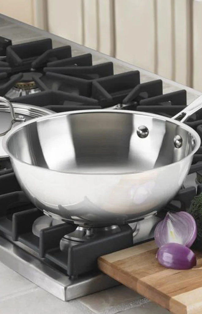 Front view of Chef’s Classic 3 Quart Chef’s Pan showcasing polished stainless steel mirror finish on a gas stovetop