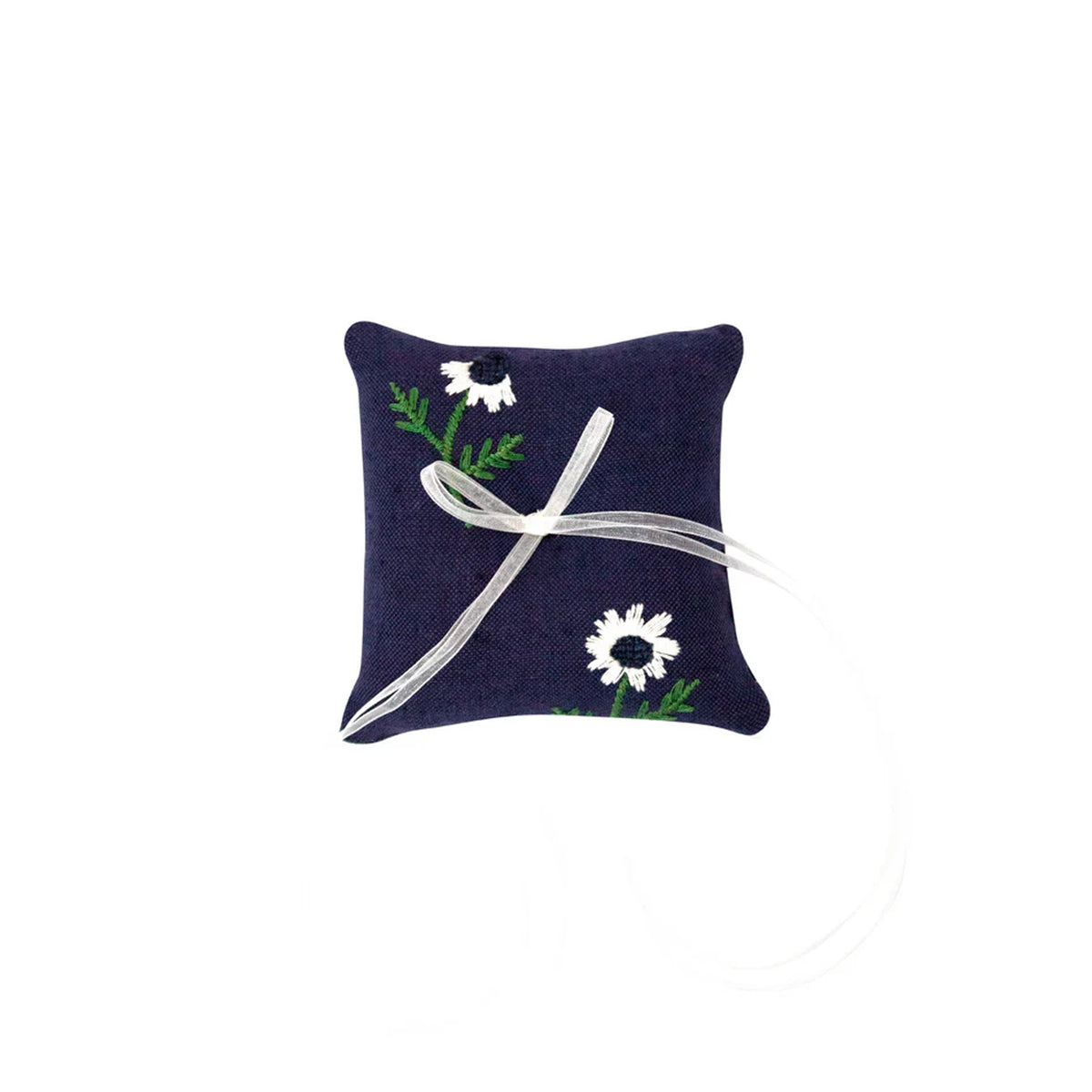 Front view of Manzanilla Ring Pillow in Navy showcasing white floral embroidery and silk organza ribbon bow on white background