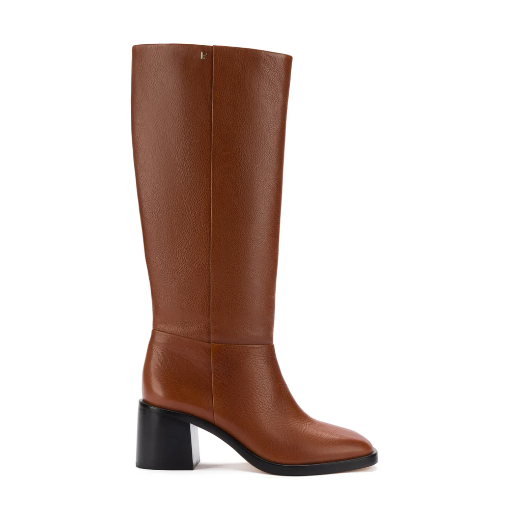 Side view of Ricky Boot in Mocca showing textured brown leather, rounded toe, 2.1-inch block heel and gold L logo on white background