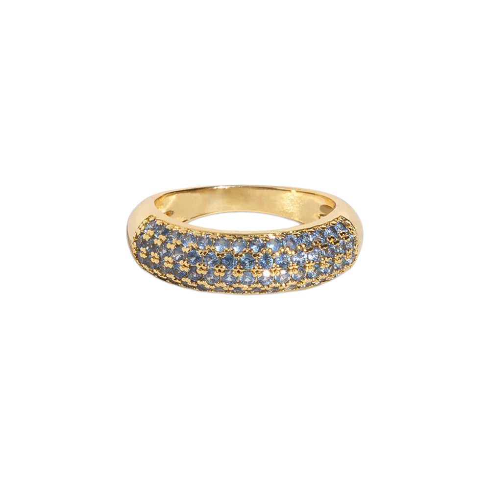 Front view of Veyra ring showcasing domed pavé band with smoked sapphire CZ stones on 18K gold finish against white background