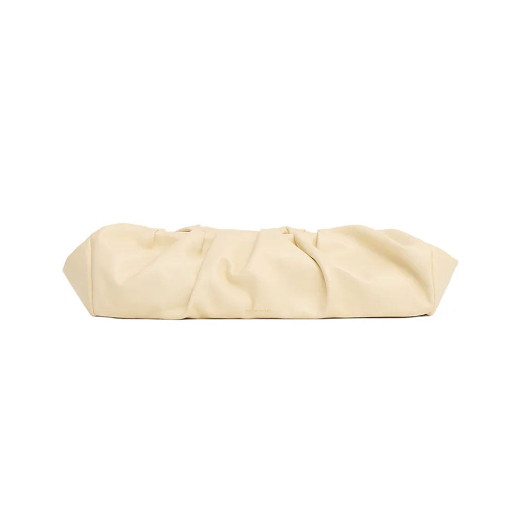 Front view of the Cloud Baguette in Jasmine showcasing its elongated sculptural silhouette on a white background