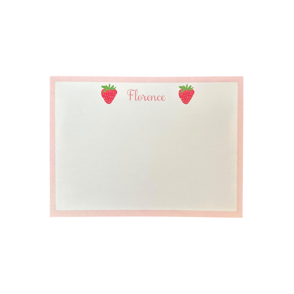 Top view of strawberry notecard personalized “Florence” showing two strawberry illustrations and a pink border on white background