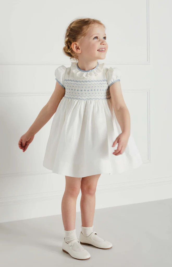 Hand Smocked Occasion Dress in Ivory with Blue Details
