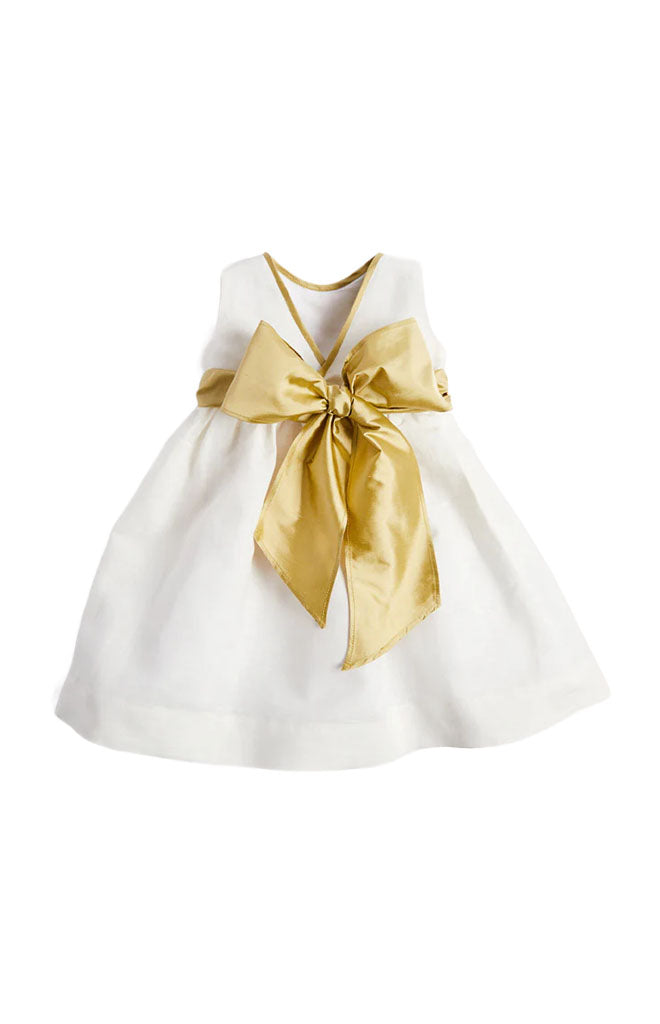 Front view of sleeveless ivory flower girl dress showcasing a large gold silk sash on a white background