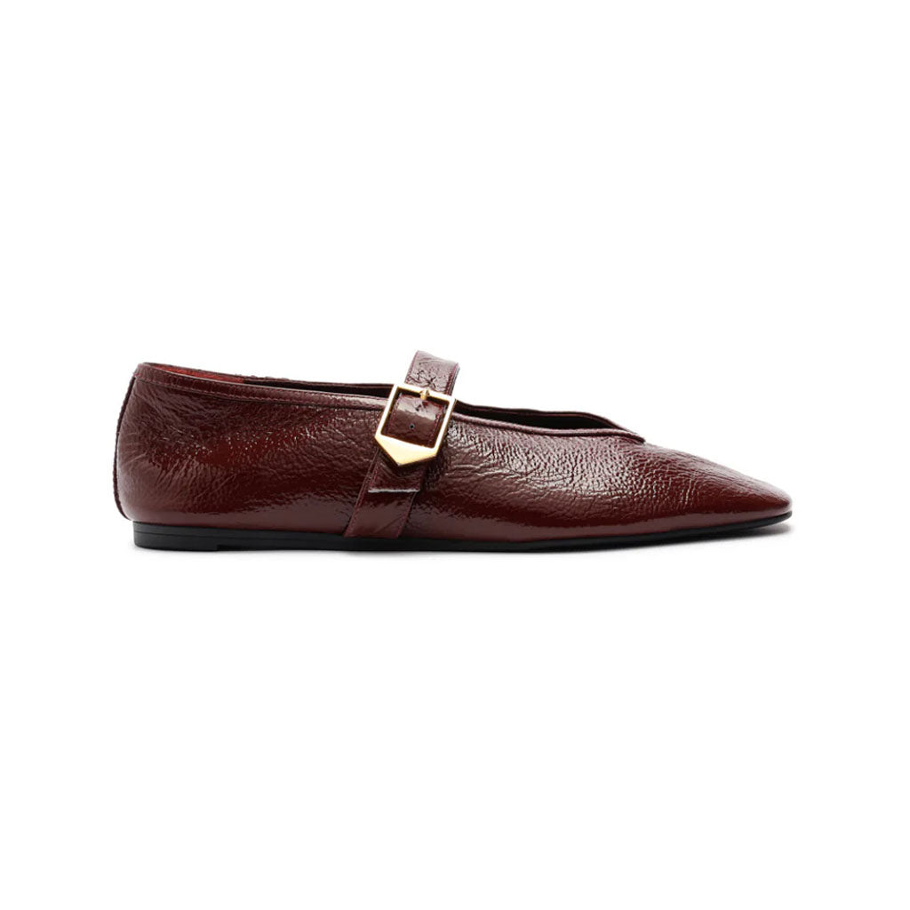 Courtney Buckle Patent Flat in Vino
