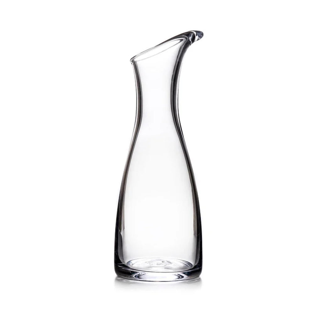 Front view of Barre Carafe showcasing its slender curved neck, pouring spout, and clear handblown glass on white background