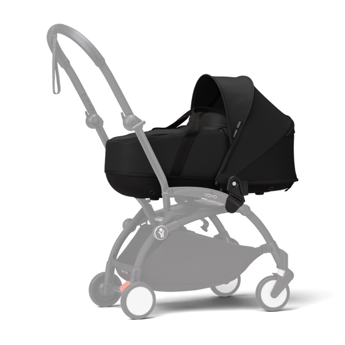 Side view of YOYO³ 0+ Newborn Pack in black attached to stroller frame showing bassinet with canopy and flat-lying nest