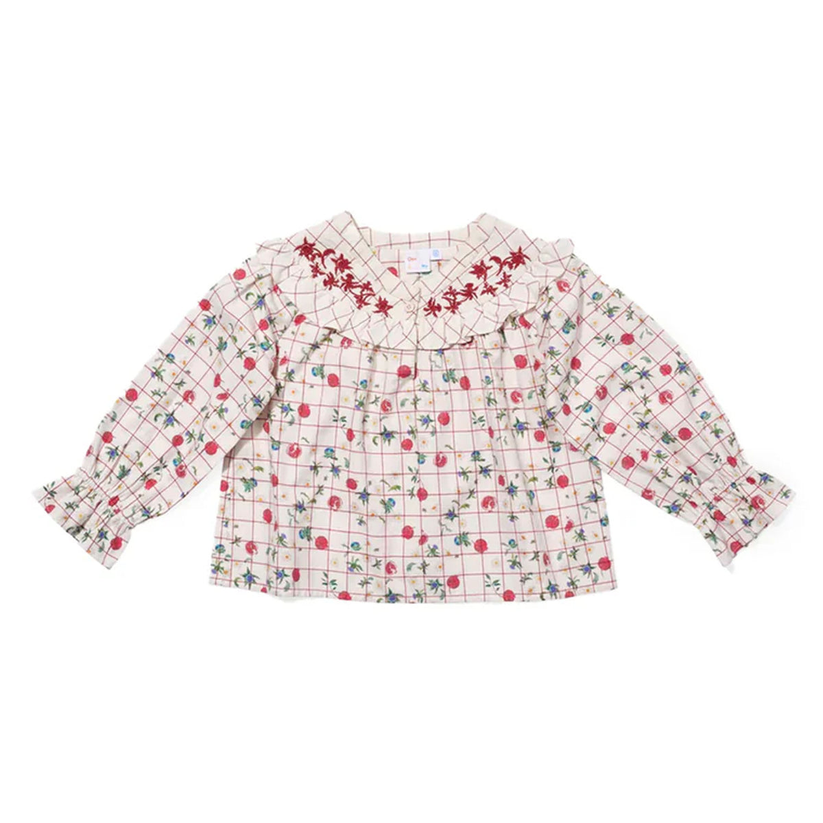Front view of Maggie Blouse in Pomegranate Plaid showcasing an embroidered floral collar and ruffled cuffs on a white background