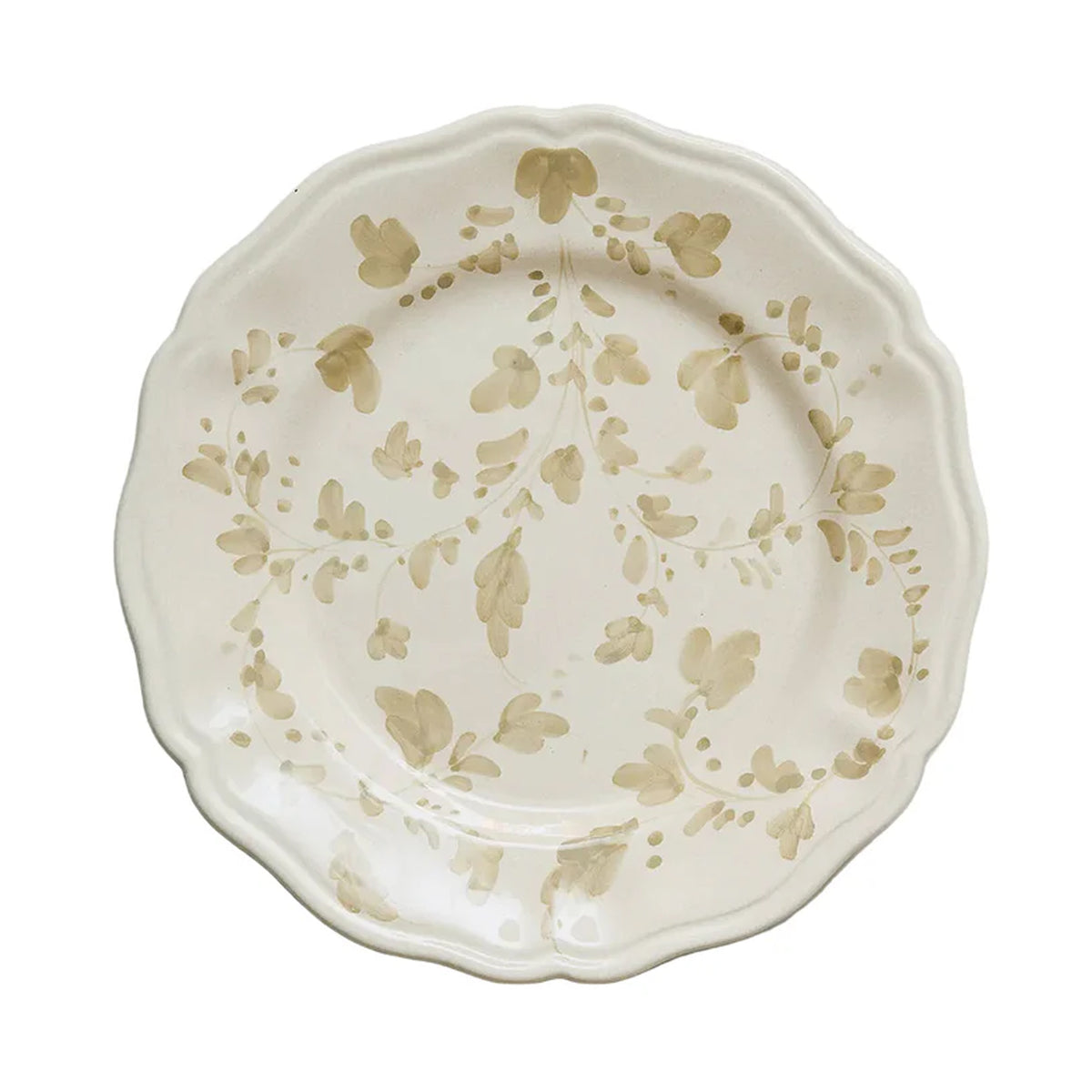 Top-down view of Flora dinner plate in ecru showcasing hand-painted floral motif and scalloped rim on white background