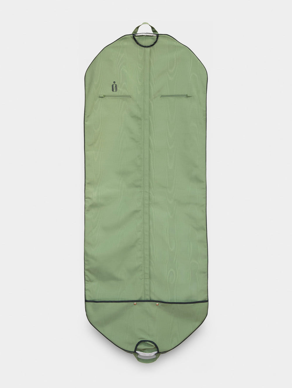 Top-down view of Classic Bag garment bag in Juniper moiré showing center zipper and two zip pockets on light gray background