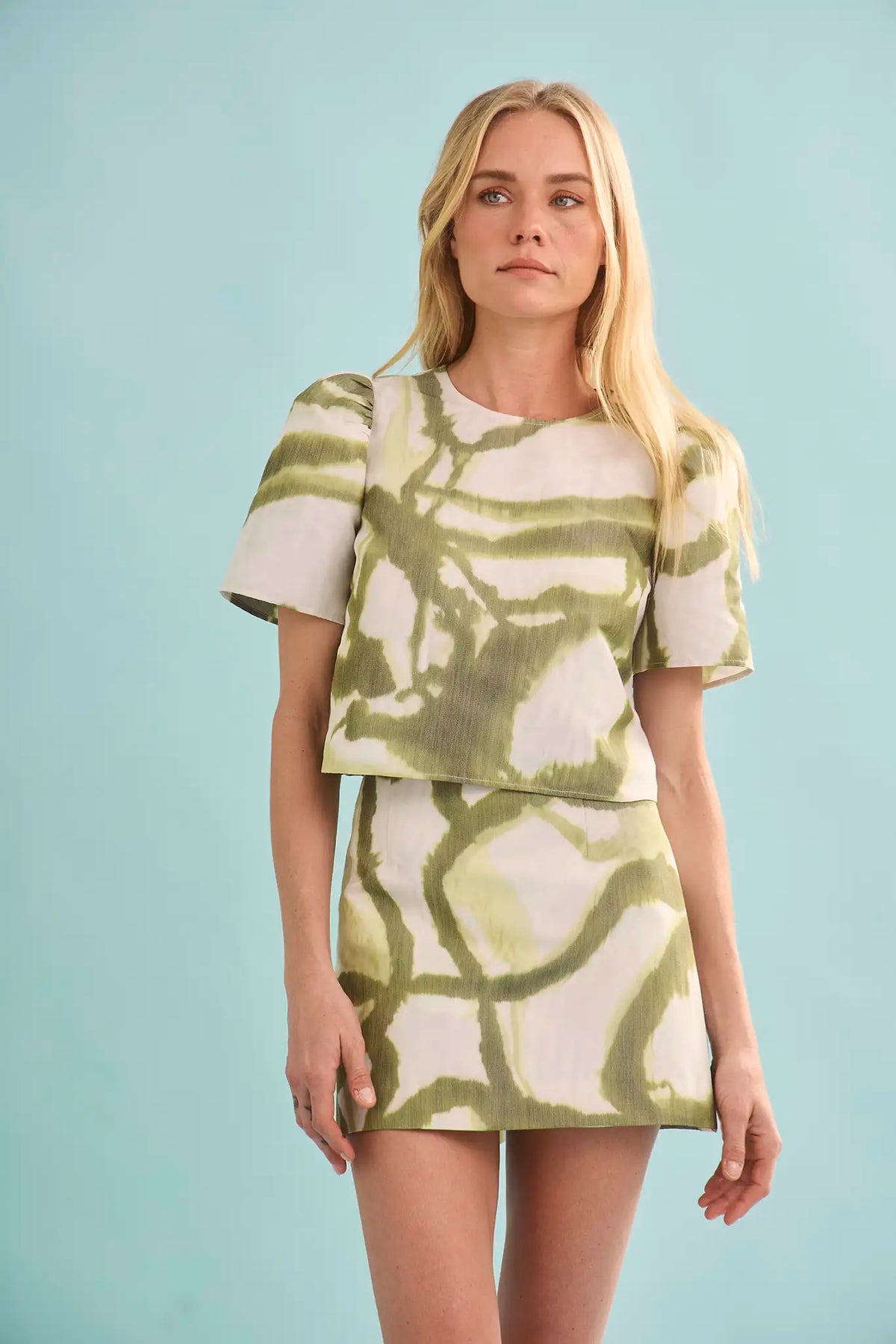 The Olivia Top in Seabreeze Ikat Green with matching Britt Mini Skirt.