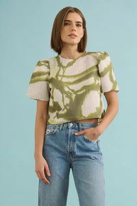 The Olivia Top in Seabreeze Ikat Green with denim.