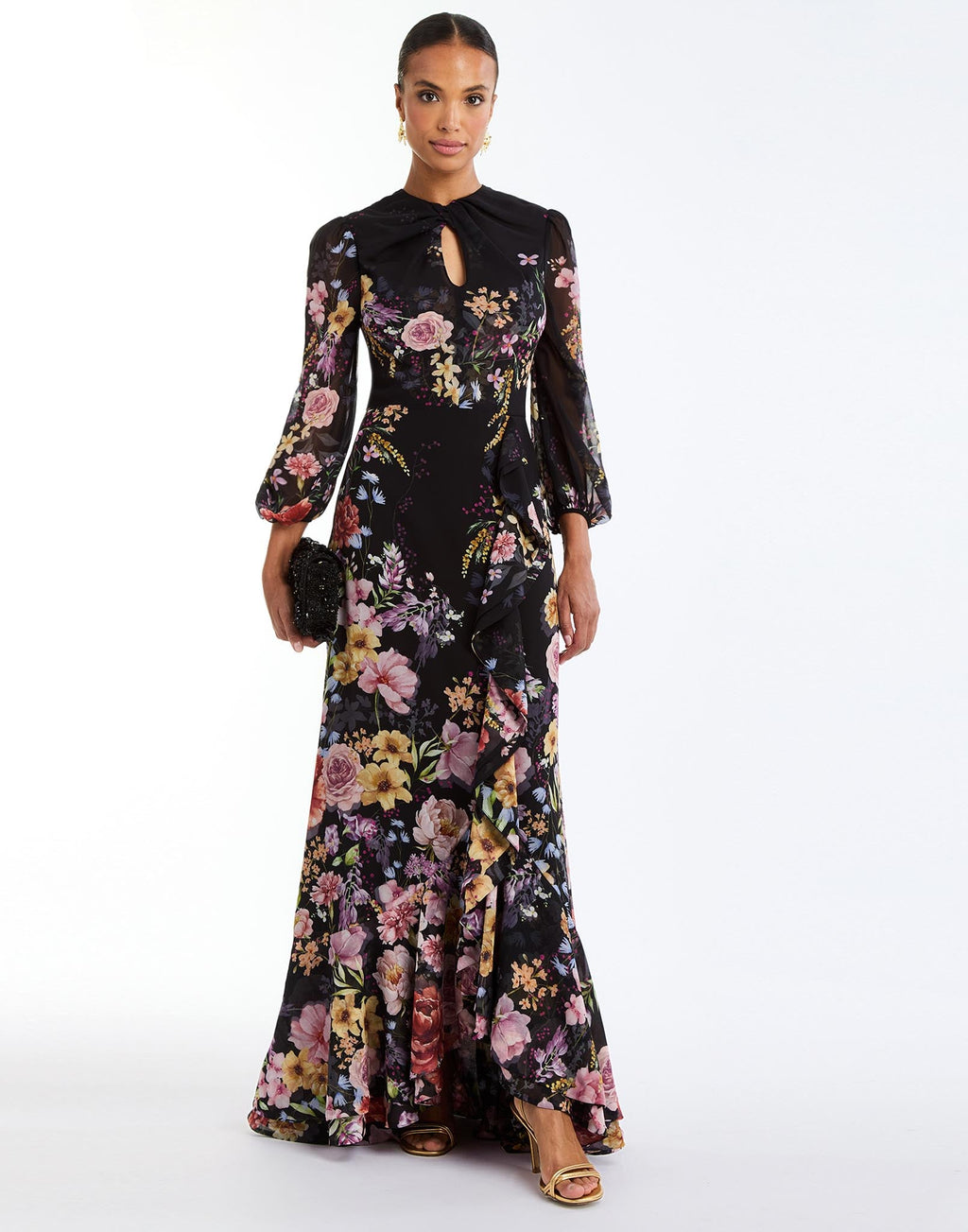Ophelia Chiffon Gown in Twilight Florals front – chiffon evening gown with twisted keyhole neckline, sheer balloon sleeves, and cascading ruffle skirt by Mestiza New York.