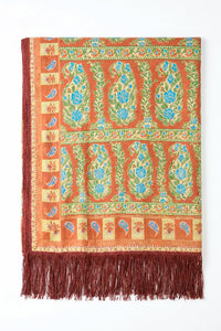 The scarf in Amber Glen Brown. 