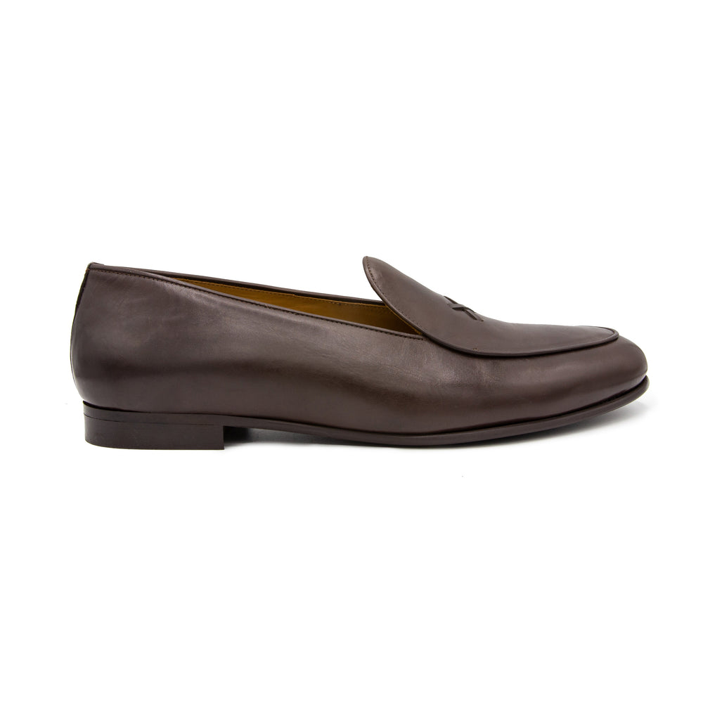 Side view of Men’s Brown Leather Milano Loafer showcasing the brown leather upper and rubber sole against a white background