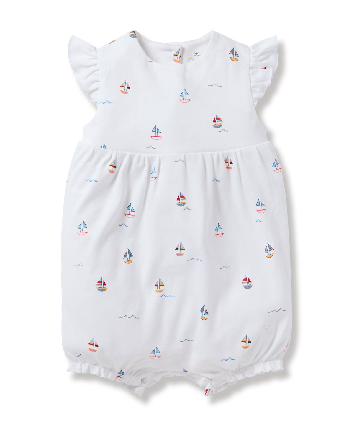 Petite Plumes Babys Pima Isla Play Romper in Bateau is a white romper made from soft Pima cotton, featuring short ruffled sleeves and colorful toy boat patterns. Its slightly puffy design with elastic leg openings offers comfort and style for your little sailor.