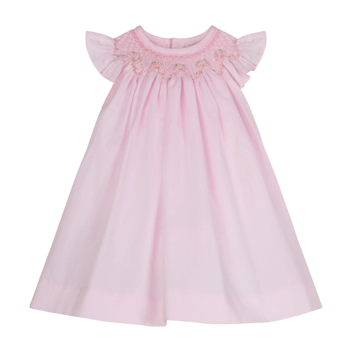 Front view of Manuela dress in light pink with smocked embroidered neckline, flutter sleeves, and A-line silhouette on white