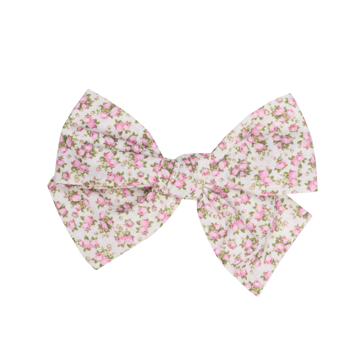 Front view of pink floral bow hair clip showing small rose print on white linen-cotton fabric against a plain white background
