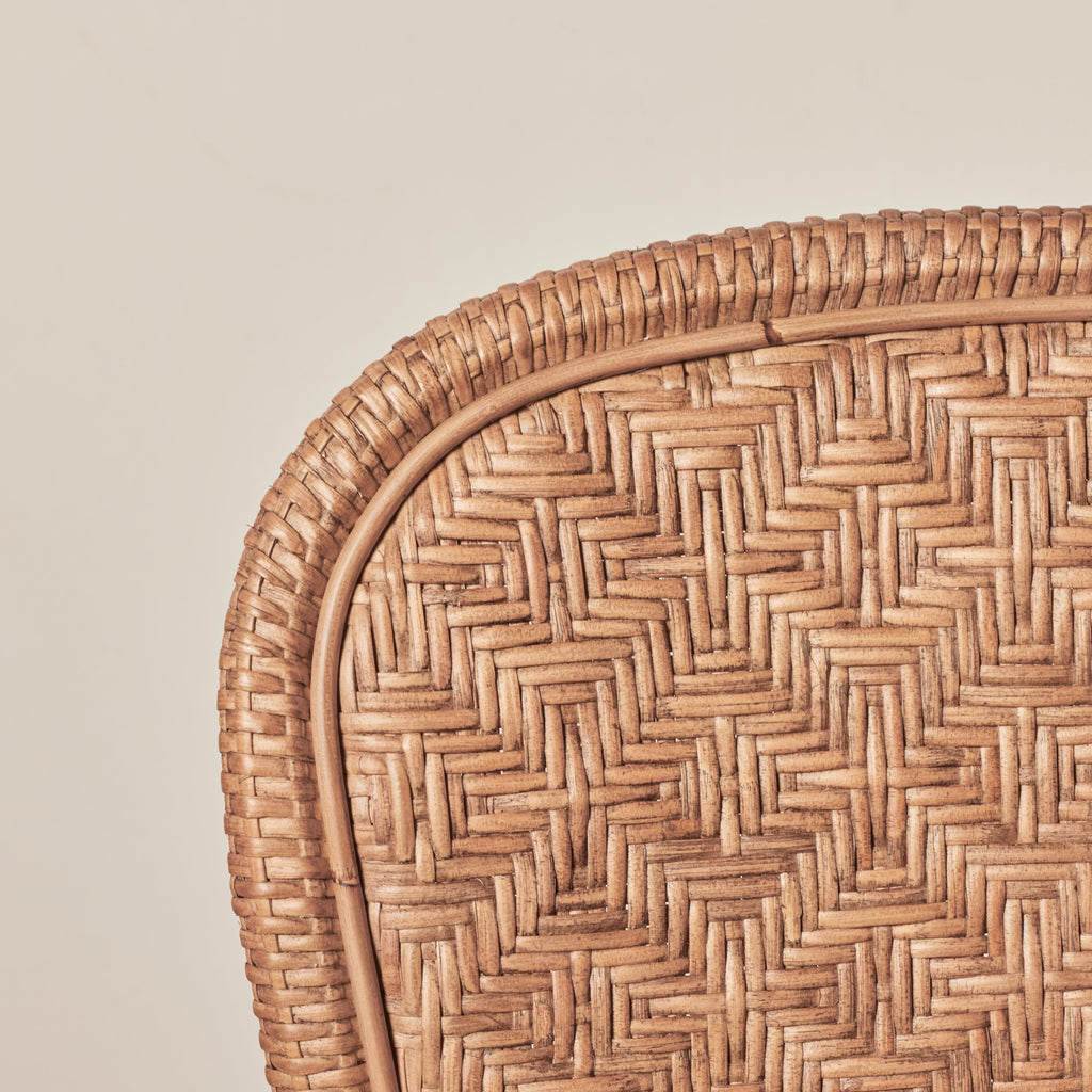 detail of backside of side chair in brown