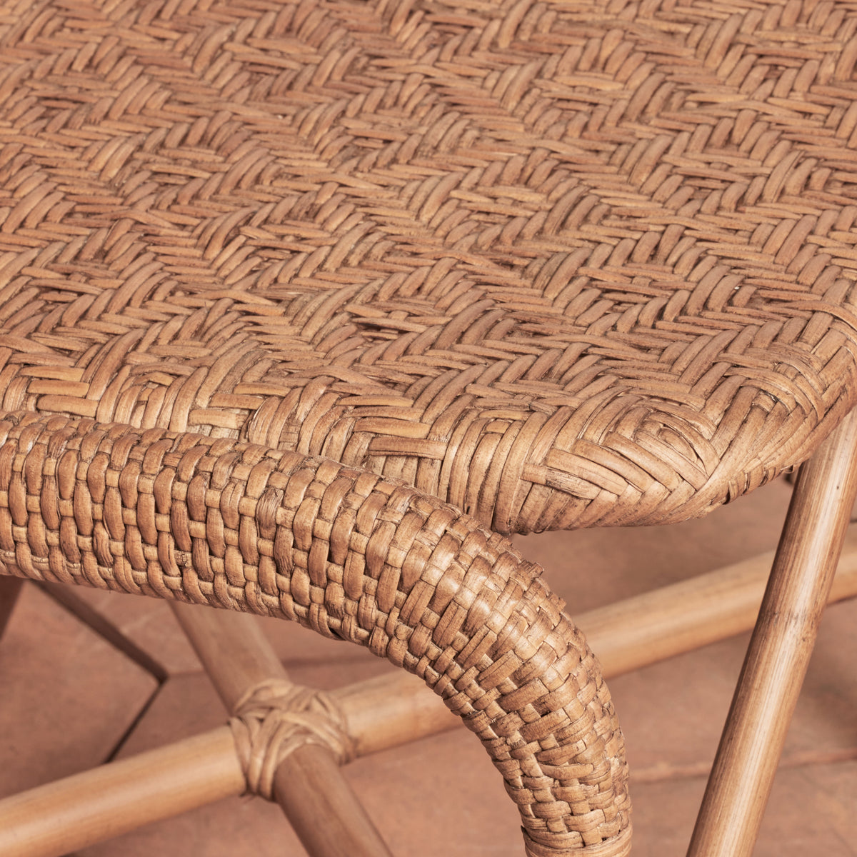 corner of side chair in brown