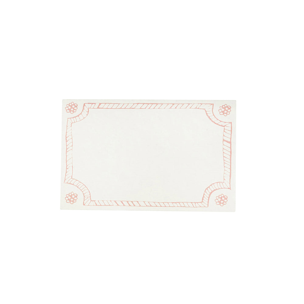Front view of a Berry & Thread place card in blush showcasing a hand-sketched border and corner motifs on a white background