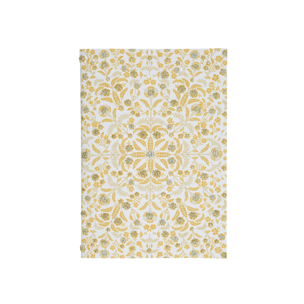 Front view of Berry & Thread Thistle 7 x 10 paper journal in gold and silver, featuring a floral thistle motif on white