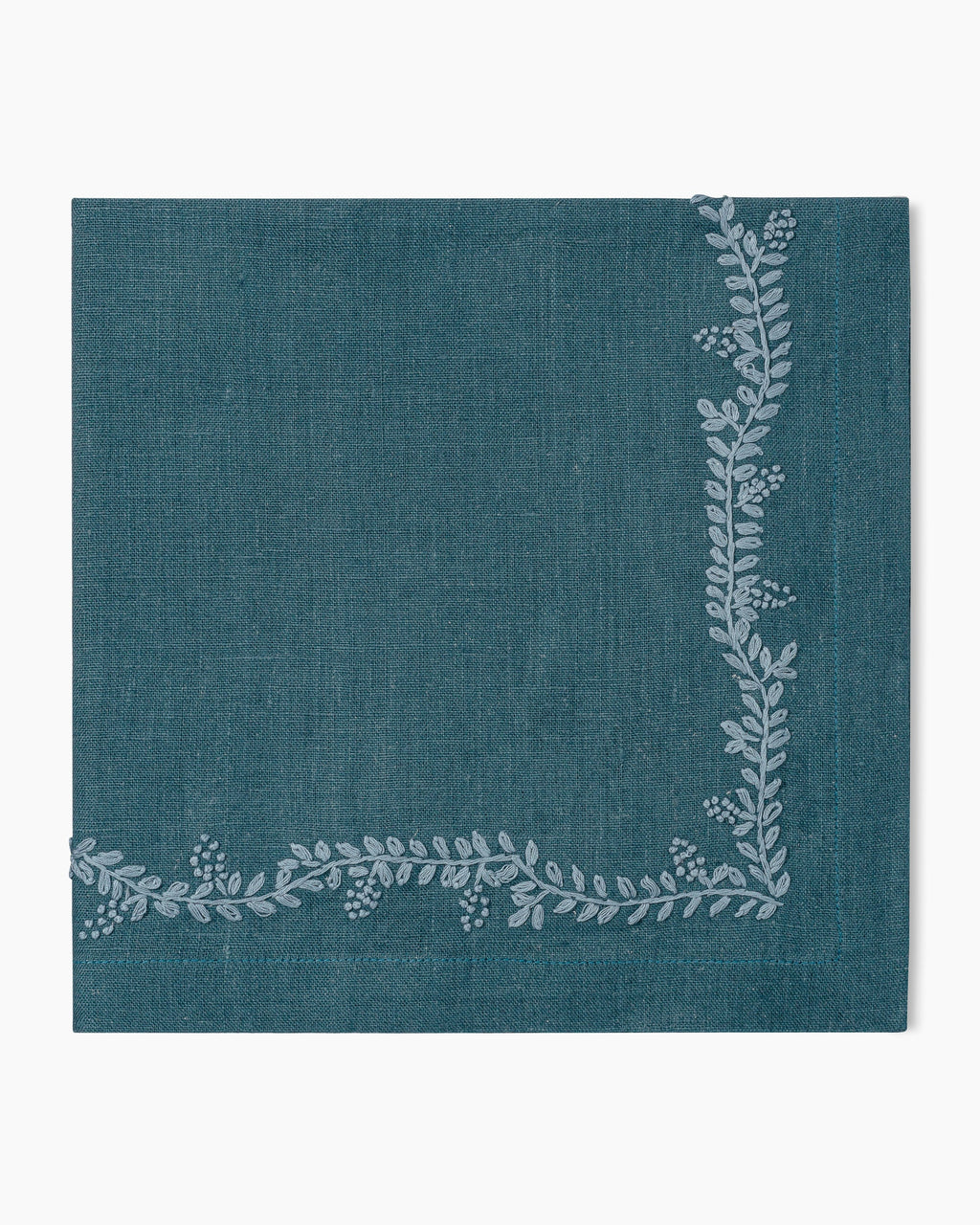 A Prism Vine Linen Dinner Napkin - 13 Colors with a floral pattern, perfect for enhancing your table linens collection.