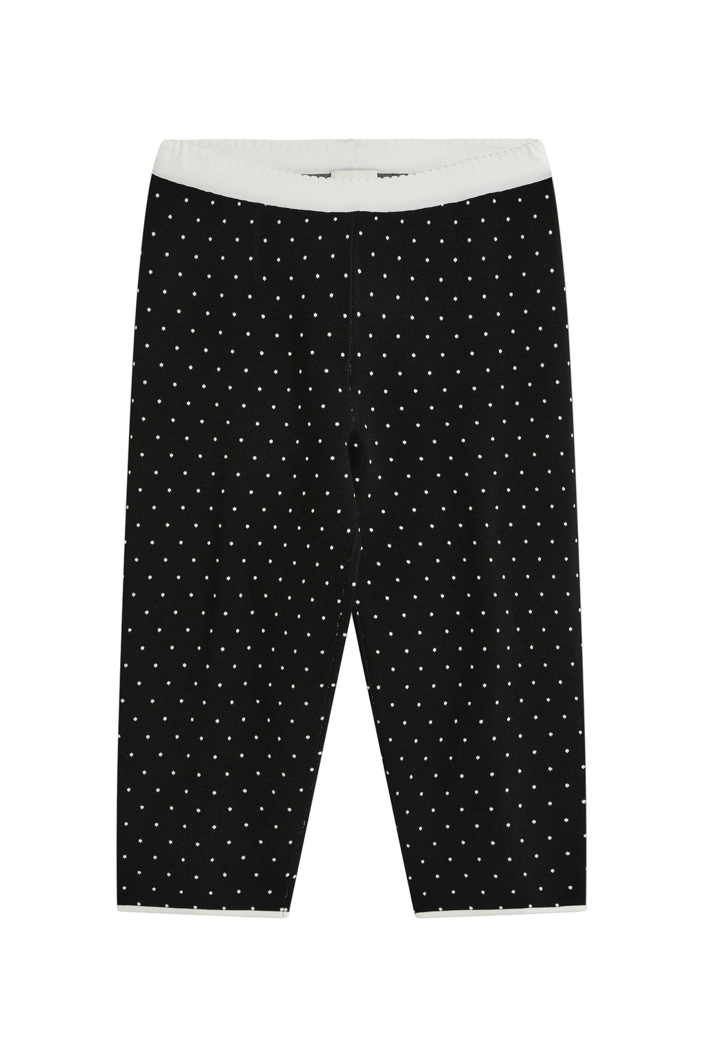 Front view of Michalla Capri in black and white polka dot showcasing the contrasting white waistband on a white background
